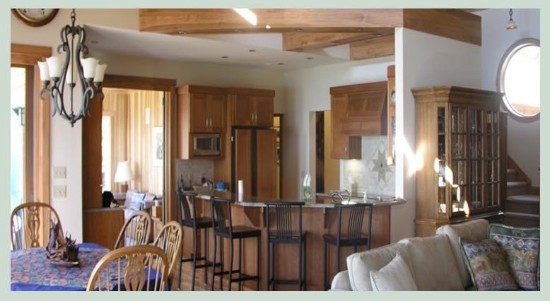 Open kitchen and dining area with chandelier