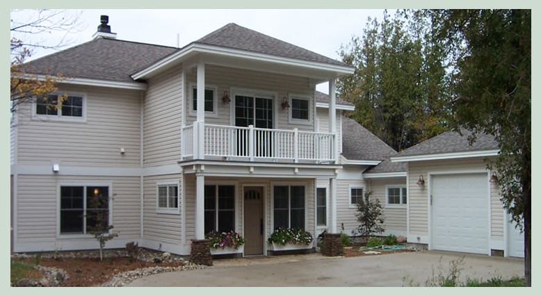 Two-story home with a balcony