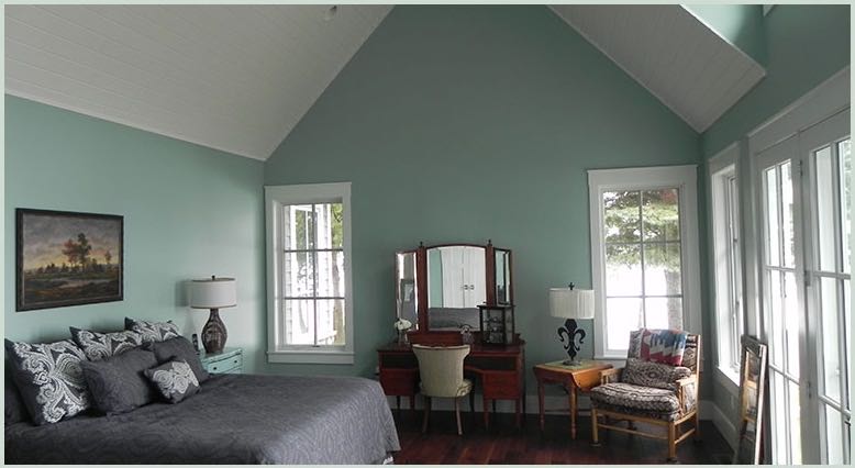 Bedroom with vaulted ceiling
