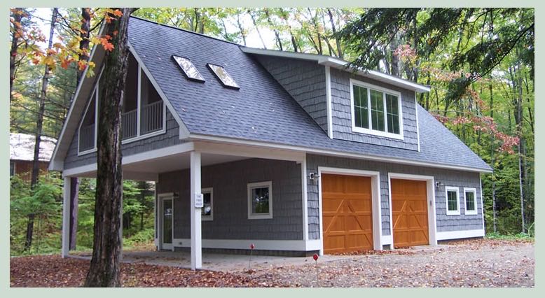 Garage with apartment above and cedar doors